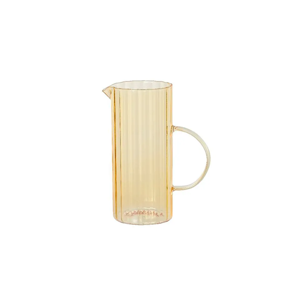 Carafe en verre transparent jaune
