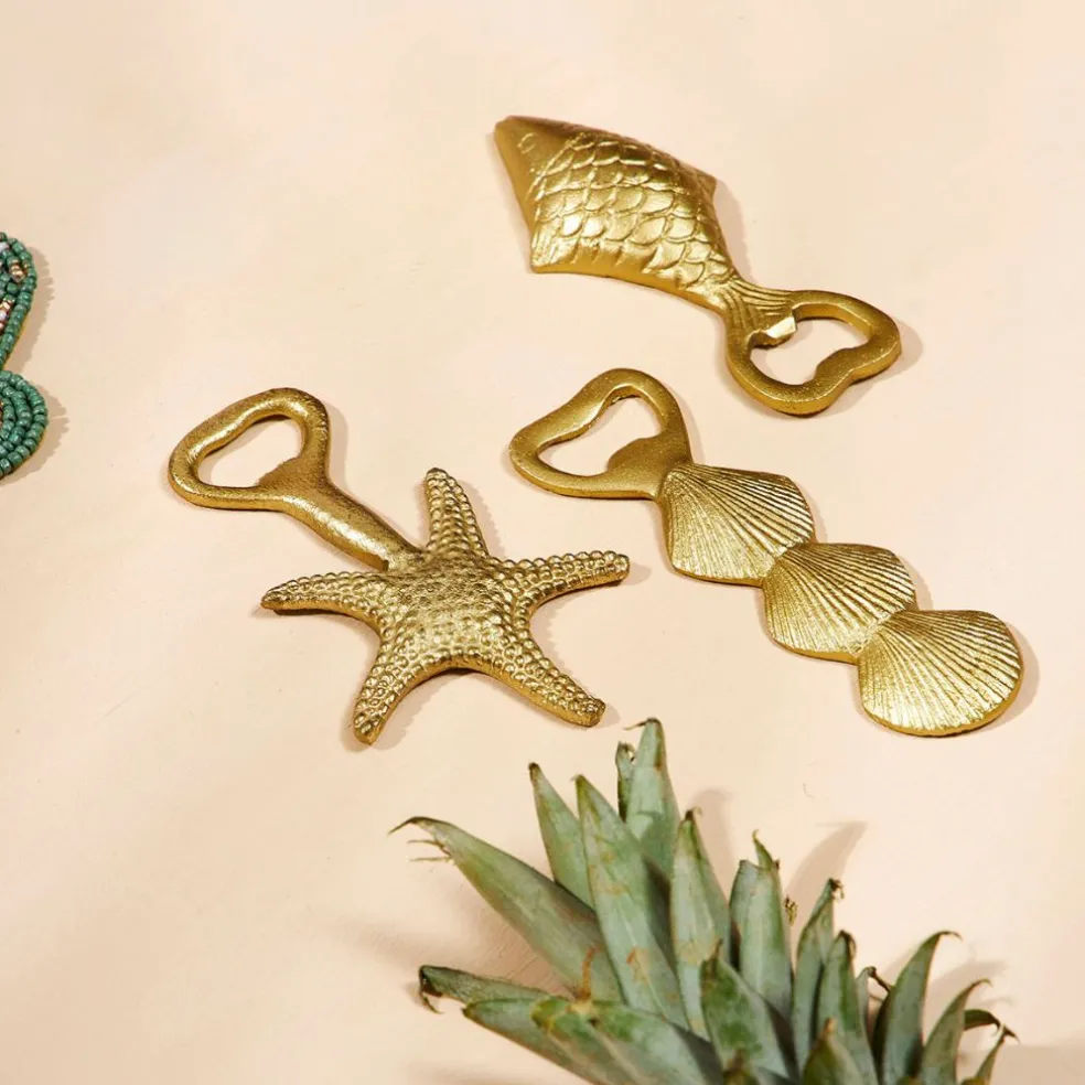 Décapsuleur en fer doré - Coquillage