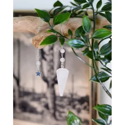 Pendule hexagonal en cristal de roche et charm étoile