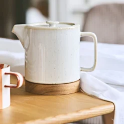 Théière avec filtre blanc moucheté 1.15l en grès et dessous en bois - nordika
